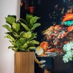 Sfeerbeeld van capi groove goud bloempot in interieur
